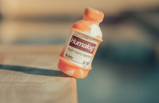 Humalog Vial Safe insulin vial case orange tie dye about to drop fall off table